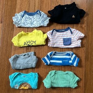 Bundle of 8 “boy leaning” 0-3 month onesies